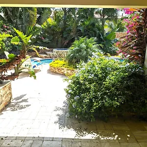 https://lovely-2-bedroom-apartment-with-tropical-garden-pool.comcaribbean.com